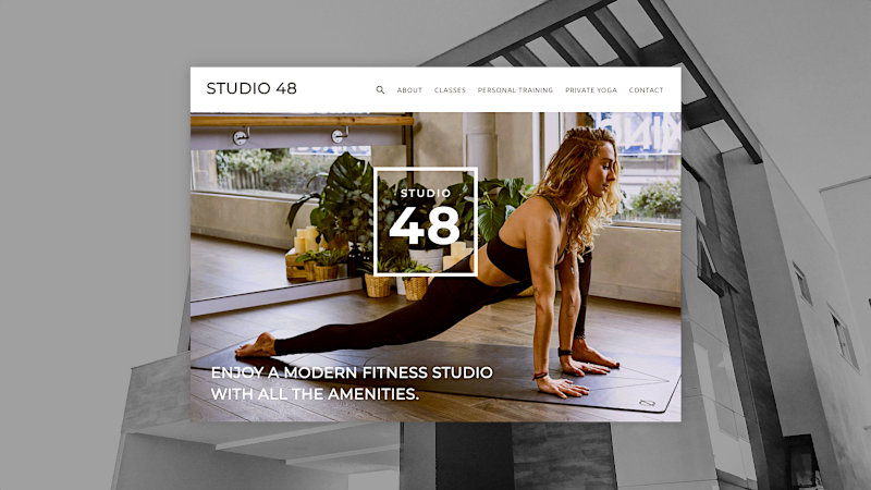 Fitness studio website homepage with woman doing yoga.